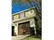 Two-story townhome with attached garage at 8550 Trail Wind Dr, Tampa, FL 33647
