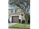 Two-story townhome with attached garage at 8550 Trail Wind Dr, Tampa, FL 33647