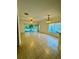 Bright and airy living room with tile floors at 8550 Trail Wind Dr, Tampa, FL 33647
