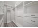 Bright, spacious closet with custom built-in shelving at 4303 Balington Dr, Valrico, FL 33596