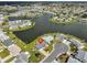 Aerial view showcasing home's waterfront location in community at 1705 Bryn Mawr Ave, Sun City Center, FL 33573