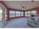 Sunroom with water views and tiled floor at 1705 Bryn Mawr Ave, Sun City Center, FL 33573