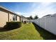 Private backyard with patio and fenced enclosure at 2117 Valterra Vista Way, Valrico, FL 33594
