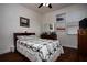 Comfortable guest bedroom with hardwood floors at 2117 Valterra Vista Way, Valrico, FL 33594