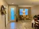 Bright dining room with tile floors and seating area at 2117 Valterra Vista Way, Valrico, FL 33594