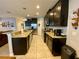 Modern kitchen with stainless steel appliances and granite countertops at 2117 Valterra Vista Way, Valrico, FL 33594
