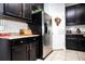 Modern kitchen with stainless steel appliances and granite countertops at 2117 Valterra Vista Way, Valrico, FL 33594
