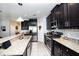 Modern kitchen with granite countertops and stainless steel appliances at 2117 Valterra Vista Way, Valrico, FL 33594