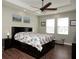 Large main bedroom with ceiling fan and hardwood floors at 2117 Valterra Vista Way, Valrico, FL 33594