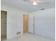 Bedroom with tiled floors and closet at 3275 Fox Hill Dr, Clearwater, FL 33761