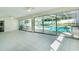 Bright sunroom with pool view and tiled floor at 3275 Fox Hill Dr, Clearwater, FL 33761