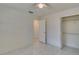 Empty bedroom with tiled floor and closet at 3275 Fox Hill Dr, Clearwater, FL 33761