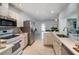 Well-equipped kitchen with stainless steel appliances and ample counter space at 3275 Fox Hill Dr, Clearwater, FL 33761