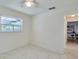Bright bedroom with tiled floors and window at 3275 Fox Hill Dr, Clearwater, FL 33761
