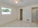 Bedroom with tiled floor and closet at 3275 Fox Hill Dr, Clearwater, FL 33761