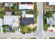 Aerial view of the property showcasing the house, yard, and surrounding neighborhood at 4004 Claremont Dr, New Port Richey, FL 34652