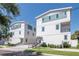 Well-maintained exterior with modern color scheme and garage, offering a welcoming curb appeal at 407 S Albany Ave # 4, Tampa, FL 33606