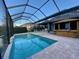 Large screened-in pool with plenty of space for relaxation at 8337 Lagerfeld Dr, Land O Lakes, FL 34637