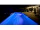 Night view of refreshing pool and patio area at 8337 Lagerfeld Dr, Land O Lakes, FL 34637