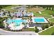 Community pool, lap pool, playground, and clubhouse at 8337 Lagerfeld Dr, Land O Lakes, FL 34637