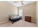 Bedroom with daybed, dresser, and plenty of floor space at 9157 Bella Vita Cir, Land O Lakes, FL 34637