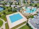 Resort-style pool with lap lanes and surrounding landscaping at 9157 Bella Vita Cir, Land O Lakes, FL 34637