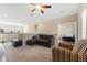 Spacious loft area with seating and access to another bedroom at 9157 Bella Vita Cir, Land O Lakes, FL 34637