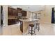 Kitchen with large island and stainless steel appliances at 9157 Bella Vita Cir, Land O Lakes, FL 34637