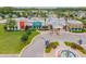 Community center featuring various shops and a covered entrance at 9157 Bella Vita Cir, Land O Lakes, FL 34637