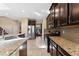 Kitchen with granite countertops and stainless steel appliances at 9157 Bella Vita Cir, Land O Lakes, FL 34637