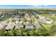 Aerial view showcasing the community and surrounding landscape at 9157 Bella Vita Cir, Land O Lakes, FL 34637
