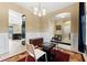 Entryway with view into dining room and kitchen at 9157 Bella Vita Cir, Land O Lakes, FL 34637