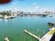 Stunning view of marina with many boats and docks at 211 Dolphin Pt # 202, Clearwater Beach, FL 33767