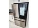 Modern stainless steel refrigerator with touchscreen at 211 Dolphin Pt # 202, Clearwater Beach, FL 33767