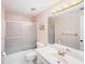 Classic bathroom featuring a shower and a vanity with plenty of counter space at 30 Turner St # 401, Clearwater, FL 33756