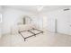 Spacious bedroom with tile floors, neutral walls, ceiling fan, and plenty of natural light at 30 Turner St # 401, Clearwater, FL 33756