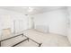Bright, open bedroom with tile floors and natural light from the window at 30 Turner St # 401, Clearwater, FL 33756
