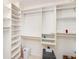 Walk-in closet with built-in storage and plenty of space for organization at 30 Turner St # 401, Clearwater, FL 33756