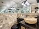 Chic bathroom with vessel sink, granite countertop, and tiled walls at 4622 W North B St, Tampa, FL 33609