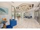 Lobby with seating area, tile floor, and unique ceiling design at 30 Turner St # 401, Clearwater, FL 33756