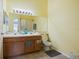 Bathroom with double sinks, toilet, and shower at 2210 Lake Woodberry Cir, Brandon, FL 33510