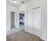 Upstairs hallway with access to bedrooms and closets at 11339 Tayport Loop, New Port Richey, FL 34654