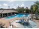 Community pool with a water playground at 11339 Tayport Loop, New Port Richey, FL 34654