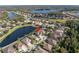 Property location shown from an aerial view, showcasing neighborhood and lake at 11339 Tayport Loop, New Port Richey, FL 34654