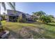 House with a large backyard and screened patio at 11339 Tayport Loop, New Port Richey, FL 34654