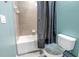 Clean bathroom with tub/shower combo and neutral tile at 11339 Tayport Loop, New Port Richey, FL 34654