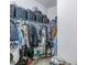 Large walk-in closet with ample shelving and hanging space at 11339 Tayport Loop, New Port Richey, FL 34654