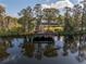 Community dock with seating area overlooking the lake at 11339 Tayport Loop, New Port Richey, FL 34654