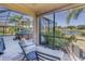 Relaxing patio with seating and lake view at 11339 Tayport Loop, New Port Richey, FL 34654