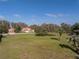 Spacious lot with views of a lake and mature trees at 11339 Tayport Loop, New Port Richey, FL 34654
